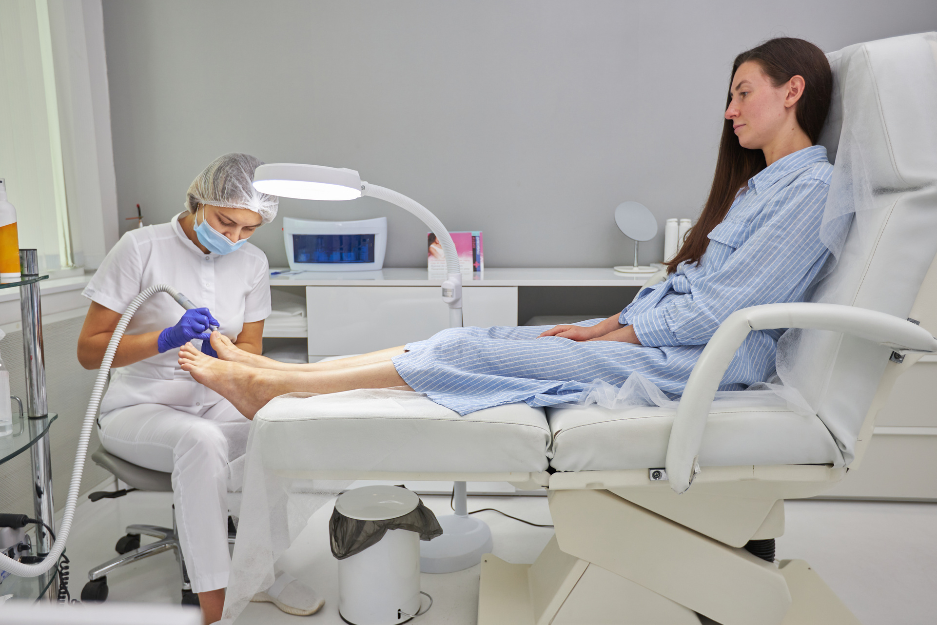 Woman Getting her Toes treated